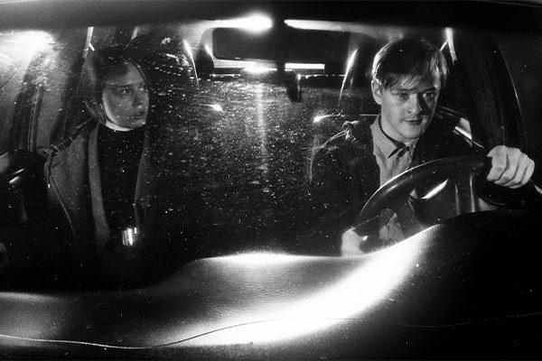 Nainen ja mies autossa / Woman and a man in a car