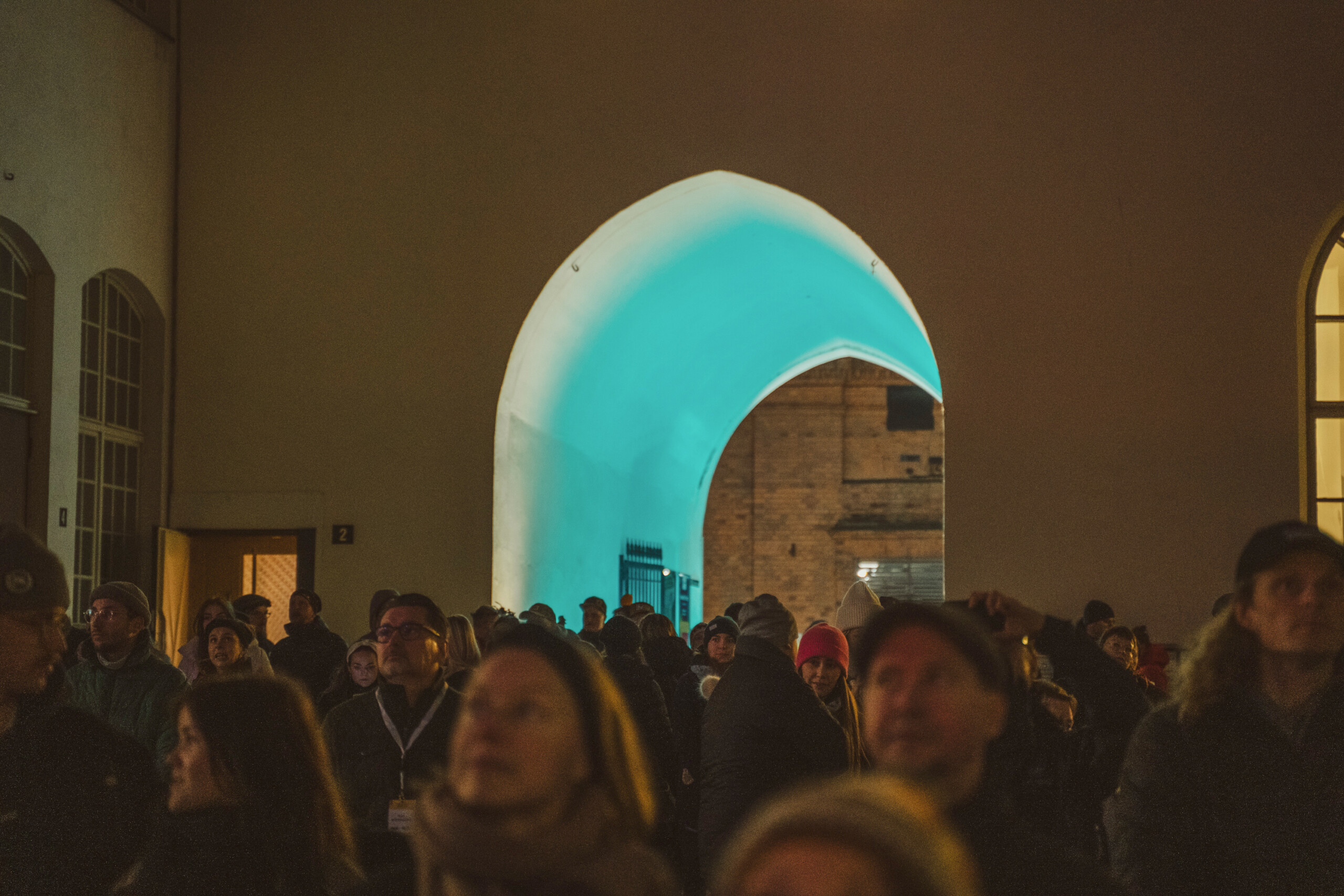 The audience looking at live visuals